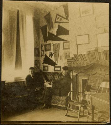 Lusby Nicholson and Robert Gill in their dorm room