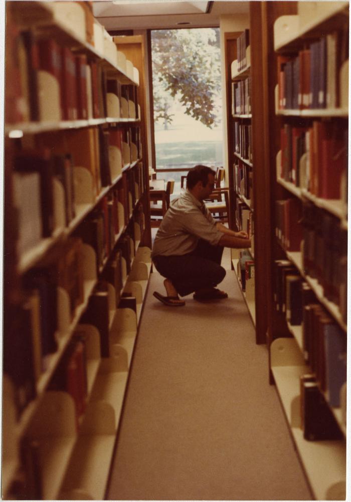 Student in the stacks