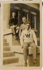 Three students on steps