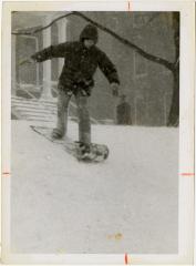 Neal tries a standing toboggan run