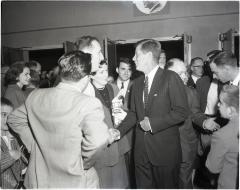 Kennedy shaking hands