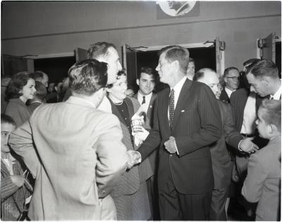 Kennedy shaking hands